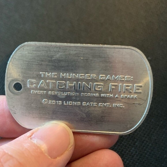 Hunger Games, Catching fire dog tag from the movie theater premiere - Picture 1 of 1